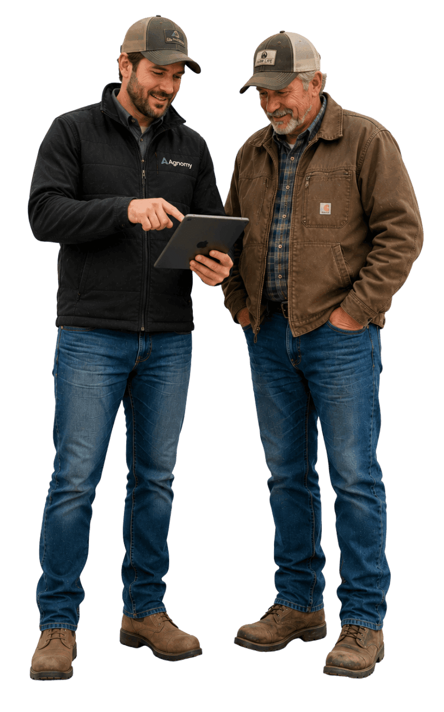 A grower and a service provider reviewing work on a tablet
